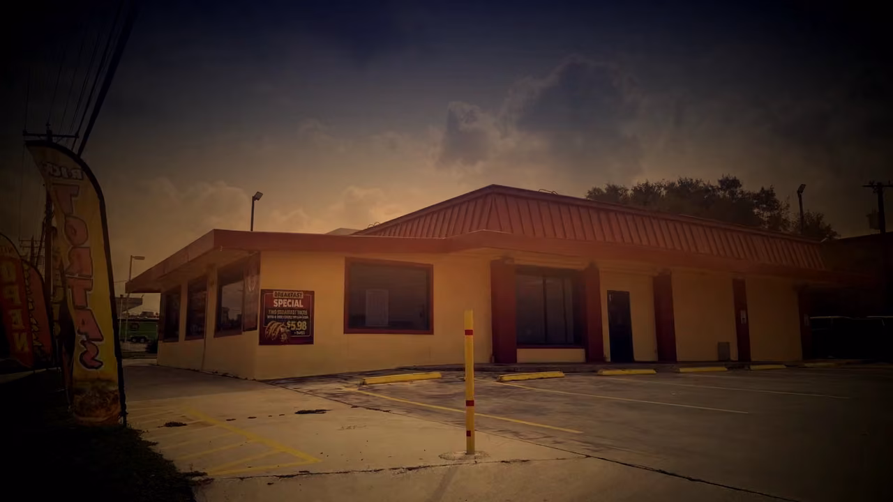 Tacos Dos Carnales on Nacogdoches Rd at dusk