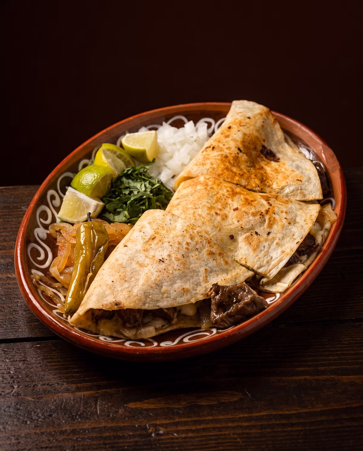Quesadilla with asada, grilled onion, cilantro and lime